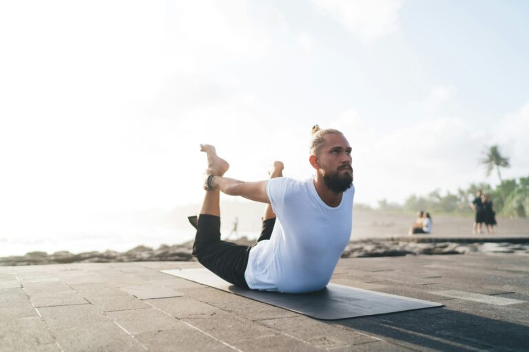 caucasian-man-enjoying-hatha-practice-for-enlightenment-harmony-and-mindfulness.jpg